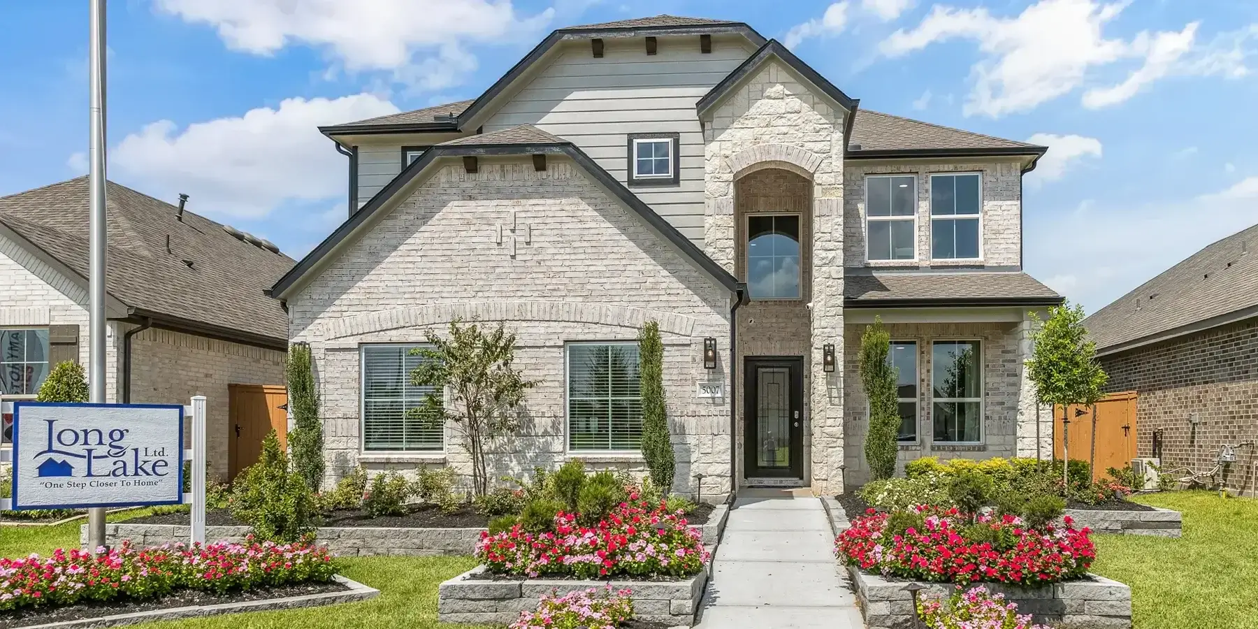 Long Lake Home Builders at Sunterra Lakes in Katy TX with New Homes for Sale